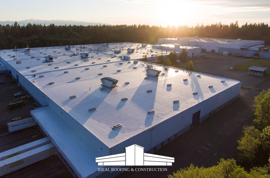 White Duro-Last commercial roof installed on a business property, showcasing durability and energy efficiency.