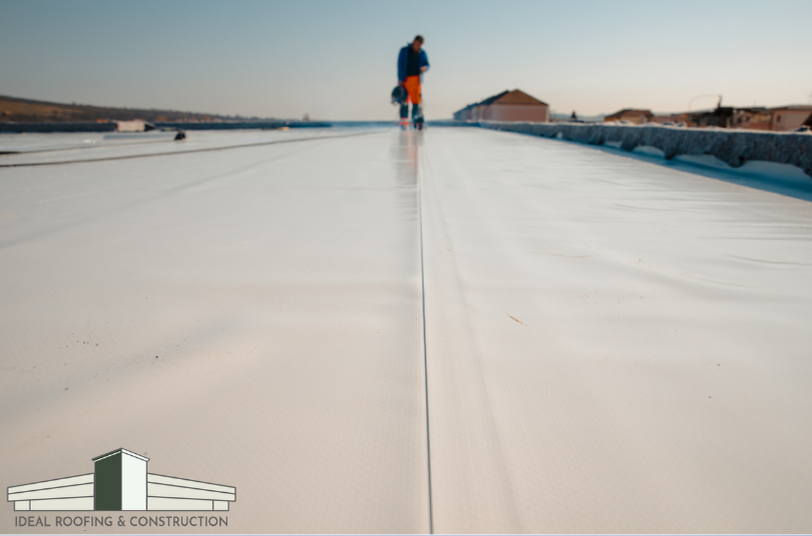 Commercial roof installer by Ideal Roofing & Construction, showcasing Duro-Last roofing in Indiana.