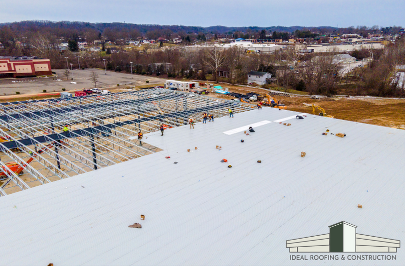 Commercial flat roof construction by Ideal Roofing & Construction, showcasing Indiana roofing expertise.